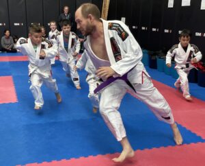 Martial Arts Instructor Declan teaching self defense class for kids